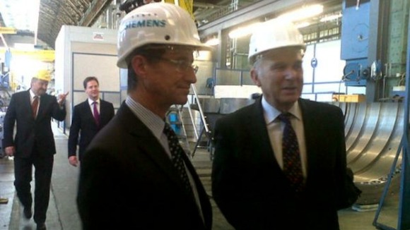 The Deputy Prime Minister Nick Clegg and the Business Secretary Vince Cable tour a Siemens factory in Berlin
