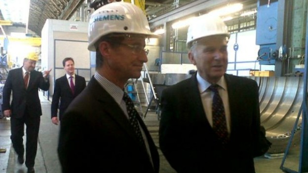 The Deputy Prime Minister Nick Clegg and the Business Secretary Vince Cable tour a Siemens factory in Berlin