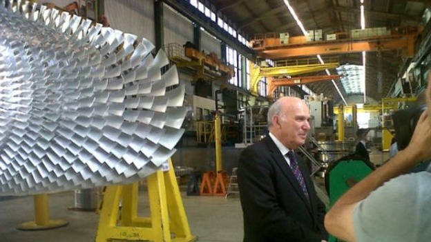 Vince Cable is seen during the tour of Siemens factory.