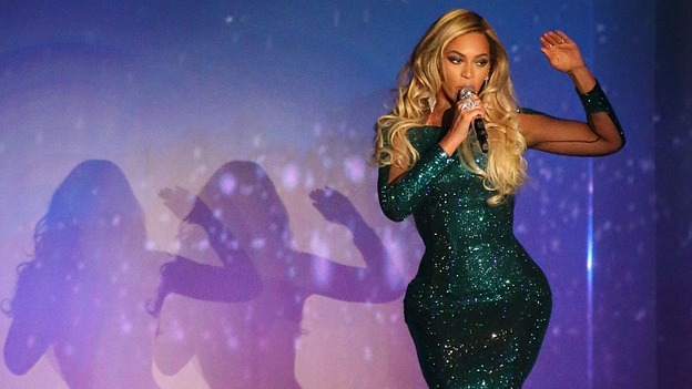 Beyonce peforms on stage during the 2014 Brit Awards.