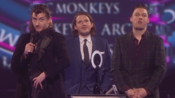 Arctic Monkeys take to the stage.