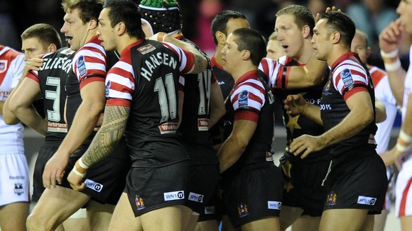 Wigan Warriors celebrate a try