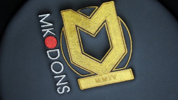 MK Dons have signed Sanmi Odelusi.