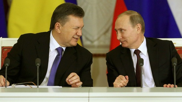 Ukraine's Viktor Yanukovich gives a wink to Vladimir Putin in December last year.