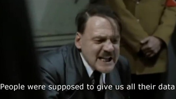 Another still shows the character playing Hitler criticising the care.data system