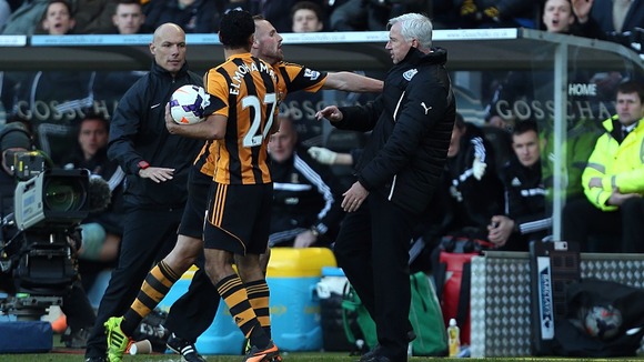 Newcastle United's manager Alan Pardew confronts Hull City's David Meyler.