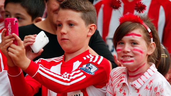 Young Sunderland fans in the stands against MK Dons.