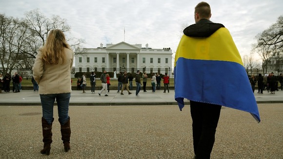 Protesters demand US action against any Russian incursion into Ukraine, in front of the White House.