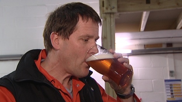Man drinking a pint