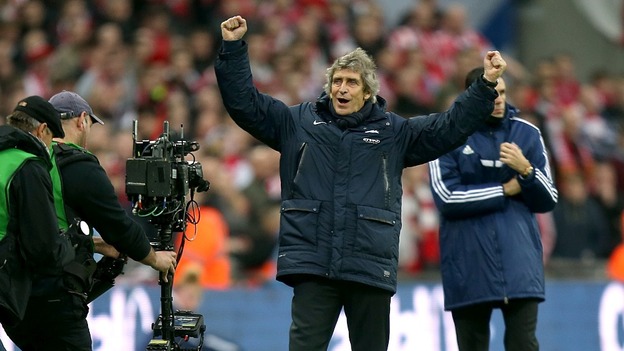 Manchester City manager Manuel Pellegrini cheered as his team beat Sunderland at the final whistle of the Capital One Cup final.