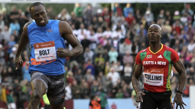 Usain Bolt approaches the finish line
