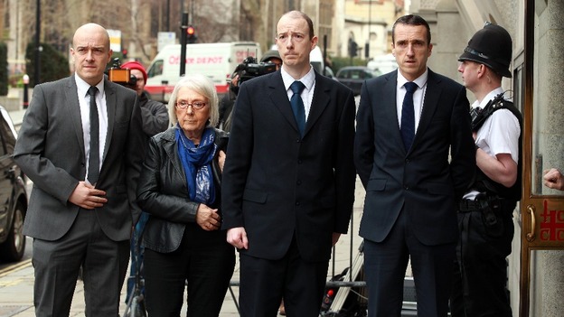 PC Blakelock's sons Lee, Kevin and Mark, along with his widow Elizabeth Johnson