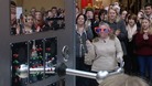 A performer dons some silly glasses in a bid to land the prize.