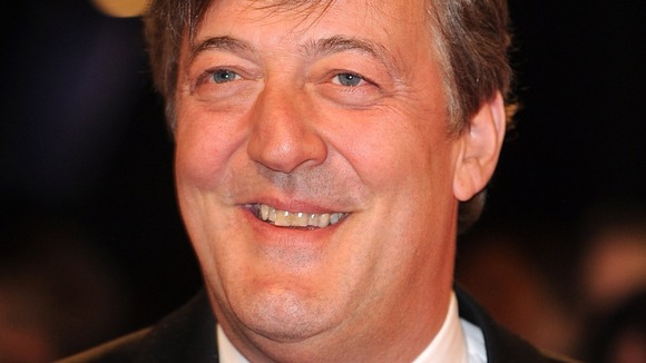 Stephen Fry smiling.