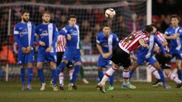 Ben Davies fires in the opening goal.