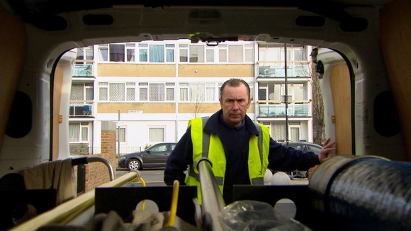 Maintenance man seen from inside van