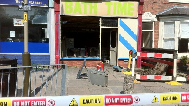 Fire damaged shop below flat