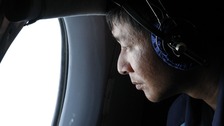 Oil slick seen in sea not from missing Malaysia plane