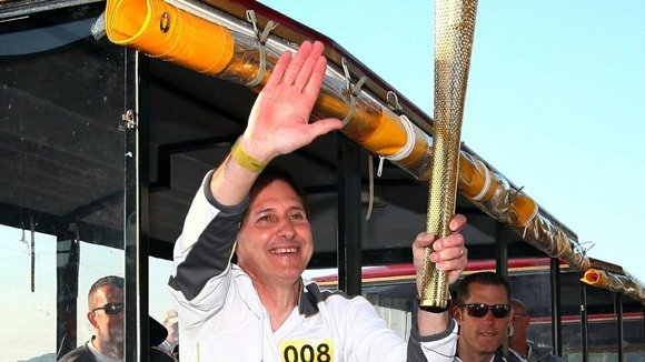 Olympic torch on train