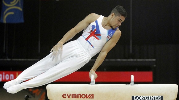 Louis Smith performs on the pommel horse during the team's final of the European Gymnastics Championships in Montpellier, Saturday