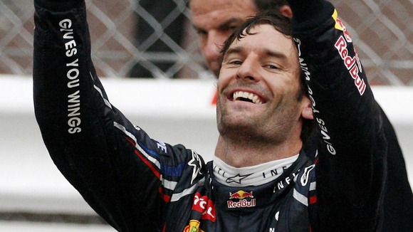 Red Bull driver Mark Webber, of Australia, celebrates after winning the Monaco Formula One Grand Prix at the Monaco racetrack, in Monaco