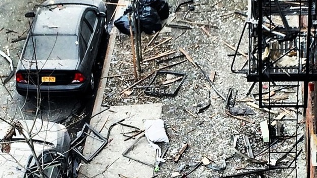 Debris and rubble fell into the streets around the site