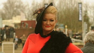 Amanda Lee from Nottingham strikes a pose on Ladies Day at Cheltenham Racecourse.