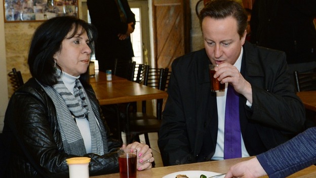 Prime Minister David Cameron takes a drink with the Mayor of Bethlehem Vera Baboun.