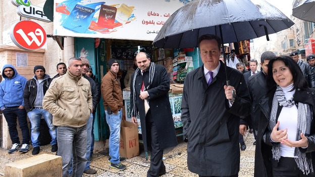 Prime Minister David Cameron is shown around Bethlehem by Mayor Vera Baboun.