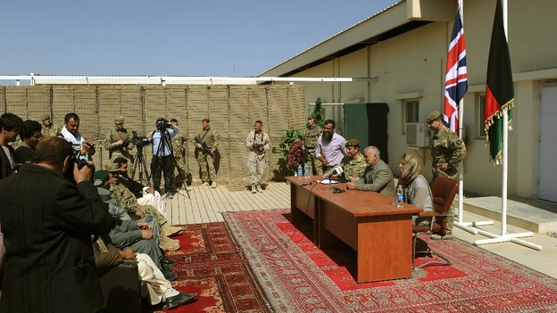 Brigadier James Woodham and the Provincial Governor of Lashkar Gah holding at the handover of Main Operating Base Lashkar Gah.