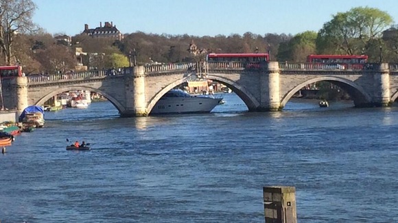 Witnesses said the yacht later passed underneath as the river level subsided later.