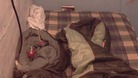 The boy's bed inside the converted coal bunker