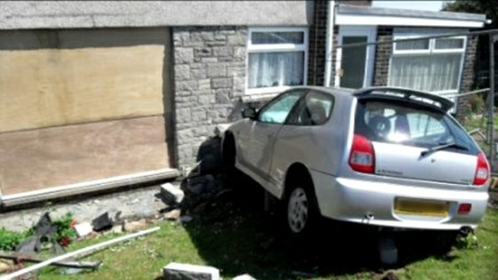 Car hit house in Barry