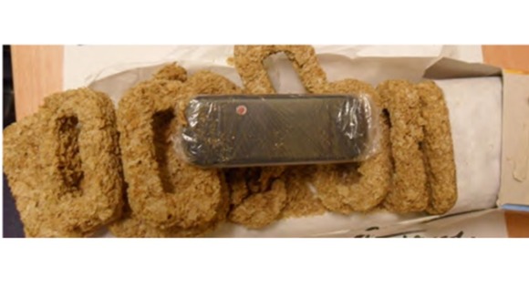 Several of the Weetabix had been hollowed out to fit the mobile phone along the centre.