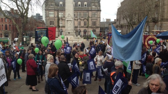 Crowd of teachers with NUT banners and balloons in Preston
