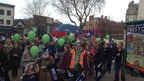 Striking teachers at a rally in Preston with banners, whistles and balloons