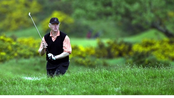 Former American President Bill Clinton enjoys a round of golf on the Old Course at the Royal and Ancient Golf Club in St Andrews.