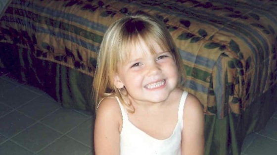 Smiling 5 year old Ellie Lawrenson at home in St Helens