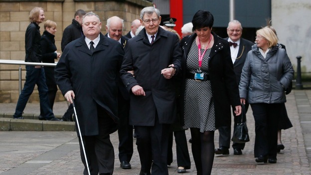 Members of the congregation arrive for the memorial service.