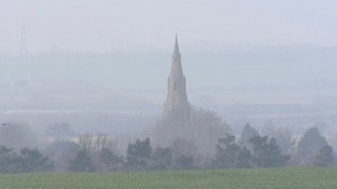 The Church of St Peter & St Paul in Alconbury in Cambridgeshire smothered by smog.