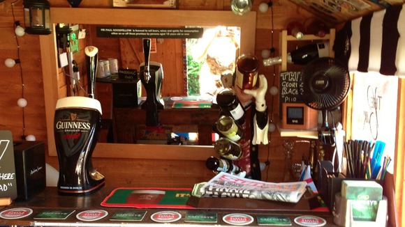 A bar in the backyard. A full stocked bar called the 'Geordie Racer'