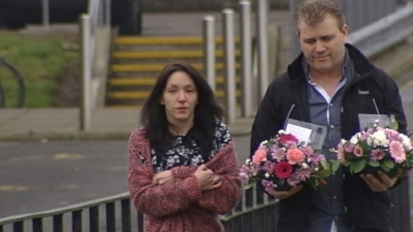 Keane Wallis-Bennett's mother laid flowers in the playground of Liberton High School.