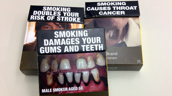 Some examples of standardised cigarette packs used in Australia.