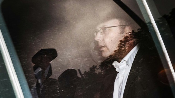 Andy Coulson arrives at Govan Police Station for questioning. 