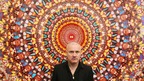 Damien Hirst with his work 'I Am Become Death, Shatterer of Worlds 2006