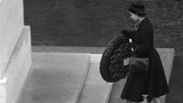 The Queen lays a wreath for the fallen