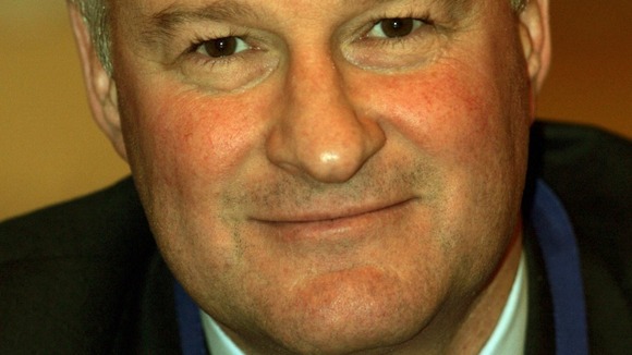 Niall Booker says management "kept the bank alive" during its troubles.