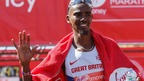 Mo Farah waves after finishing in eighth place at the London Marathon 2014.