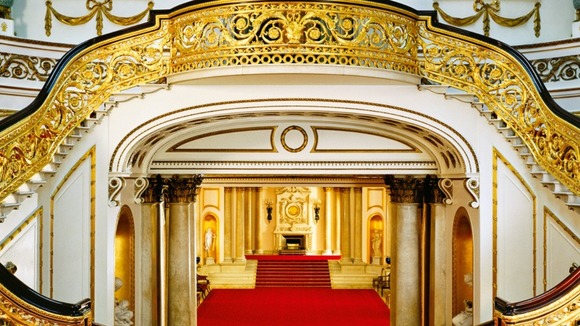 The grand staircase at Buckingham Palace, as depicted in a new set of stamps
