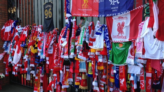 Scarves hanging from stadium gates
